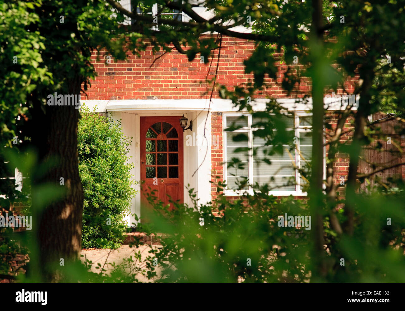 front view of door to thirties semi detached house in home counties Surrey UK Stock Photo