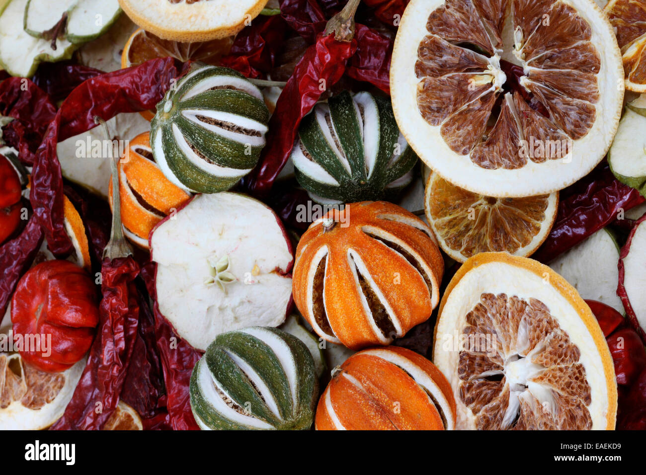 dried limes, apples, oranges, peppers, lemons a pot pouri of festive fruit Jane Ann Butler Photography JABP1099 Stock Photo