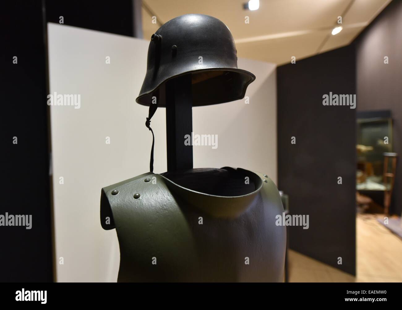 A helmet and armour for trench soldiers from 1918 is on display in the Museum for Sepulchral Culture in Kassel, Germany, 13 November 2014. It is part of the exhibition 'Die Verwandlung. Sterben und Trauer 1914 bis 1918' (Metamorphosis. Death and Mourning 1914 to 1918) which opens on 14 November. Photo: UWE ZUCCHI/dpa Stock Photo