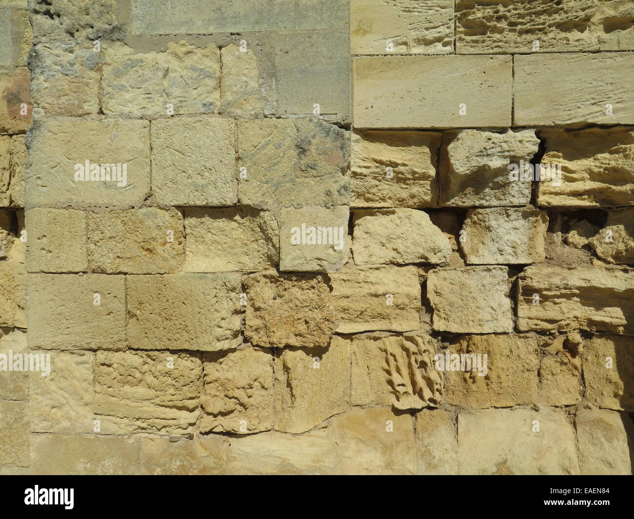 Ancient Limestone wall with weathering and pollution effect Stock Photo