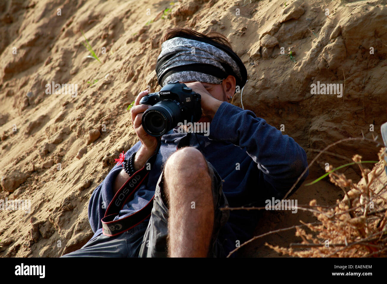 cameraman, tourist, male, canon, DSLR, shooting, in Pushkar, Rajasthan, India. Stock Photo