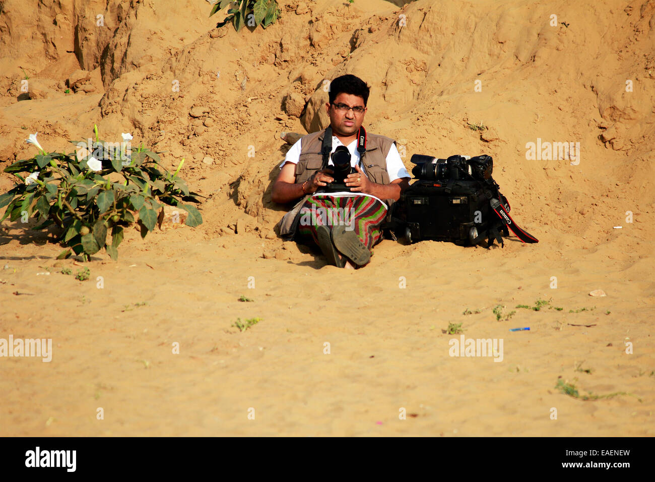 cameraman, tourist, female, canon, DSLR, shooting, in Pushkar, Rajasthan, India. Stock Photo