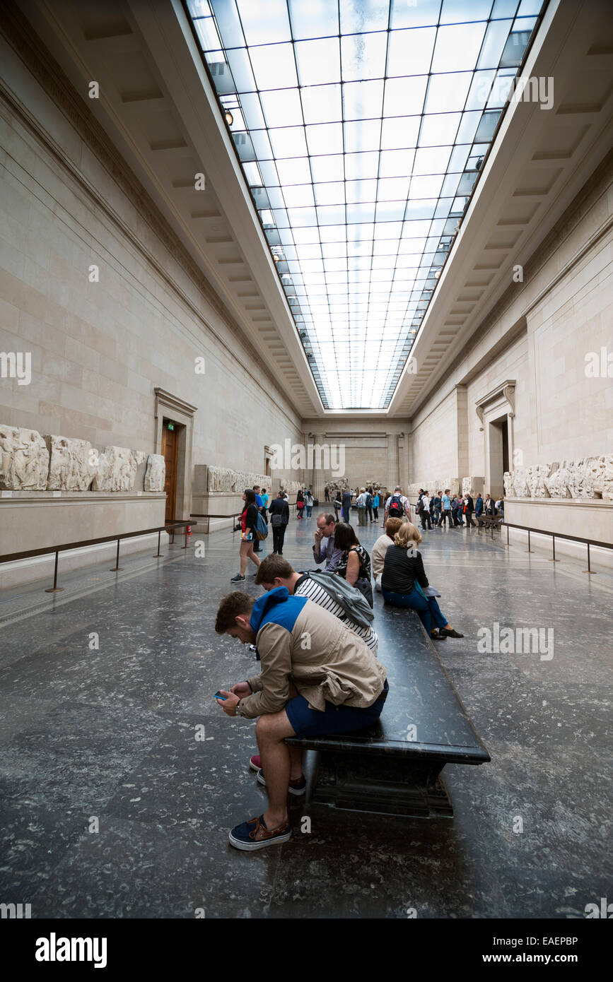 LONDON, UNITED KINGDOM - JUNE 5, 2014: British Museum. Visitors in the room where the sculptures from the Parthenon exposed Stock Photo