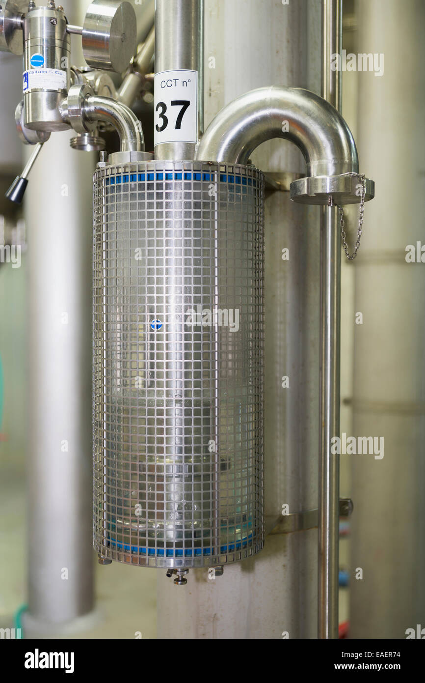 CO2 escape valve on fermentation tank at brewery. Stock Photo