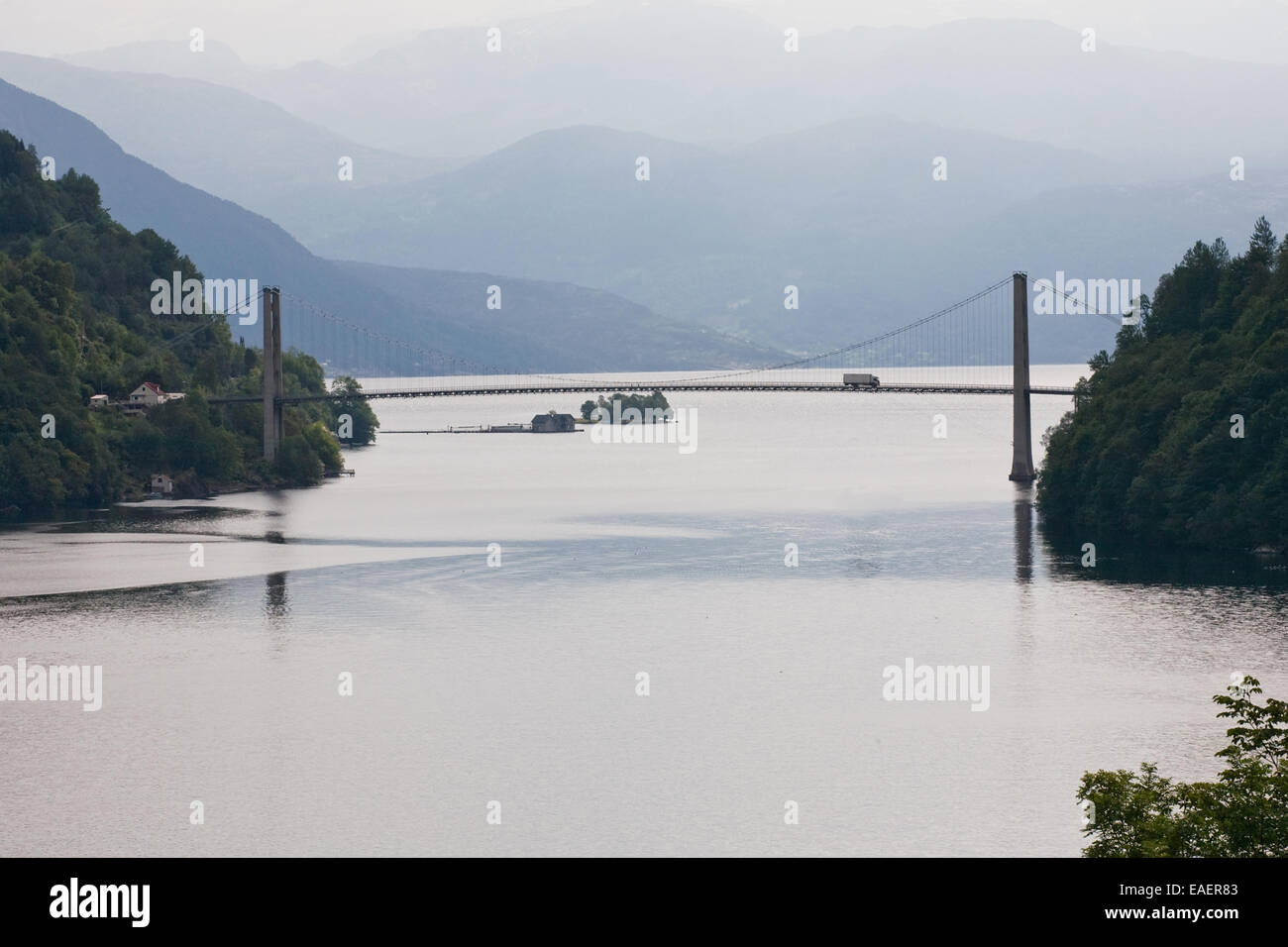 cable stayed bridge on beautiful Norwegian landscape background Stock Photo