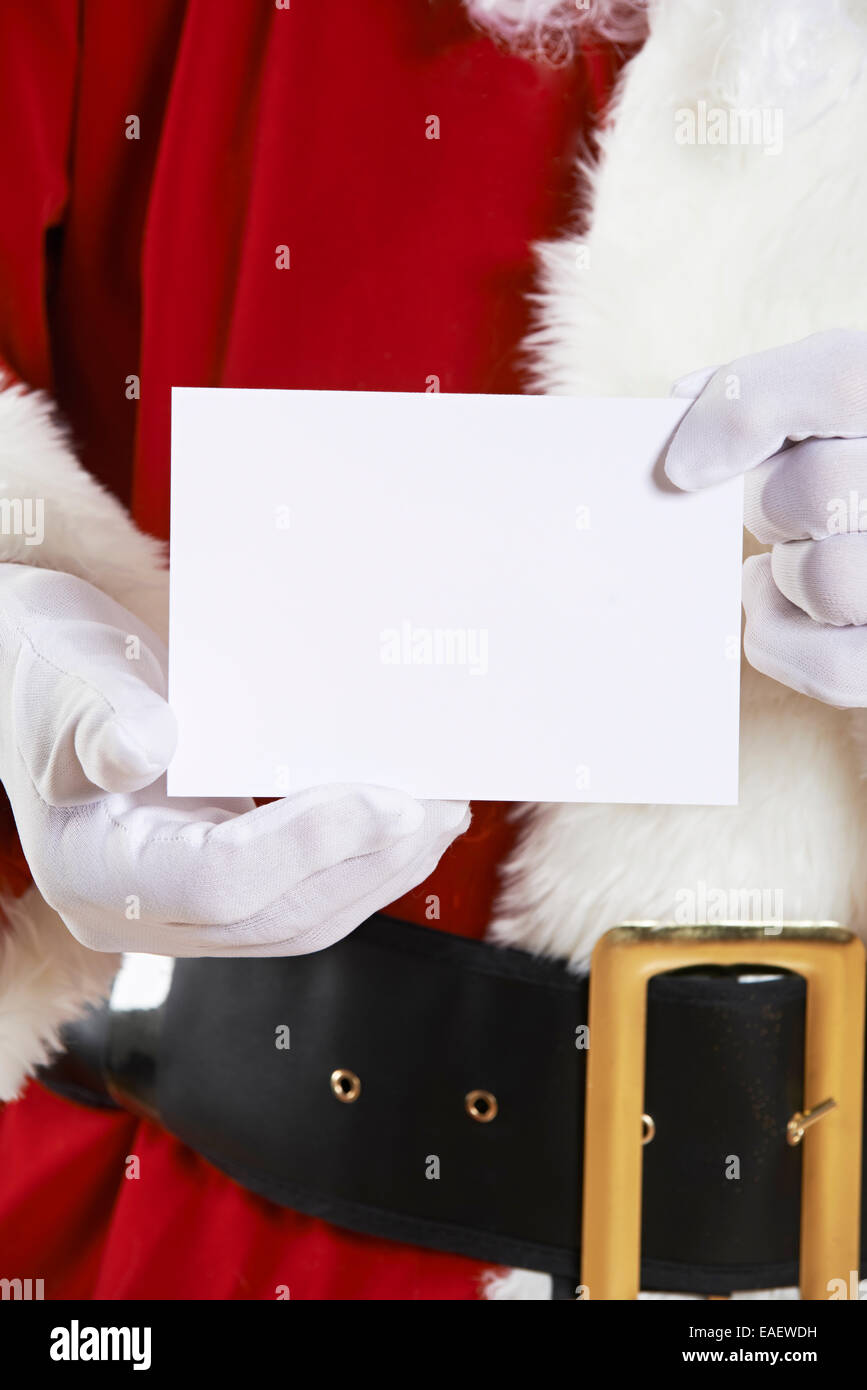 Close Up Of Santa Claus Holding Blank Invitation Stock Photo - Alamy
