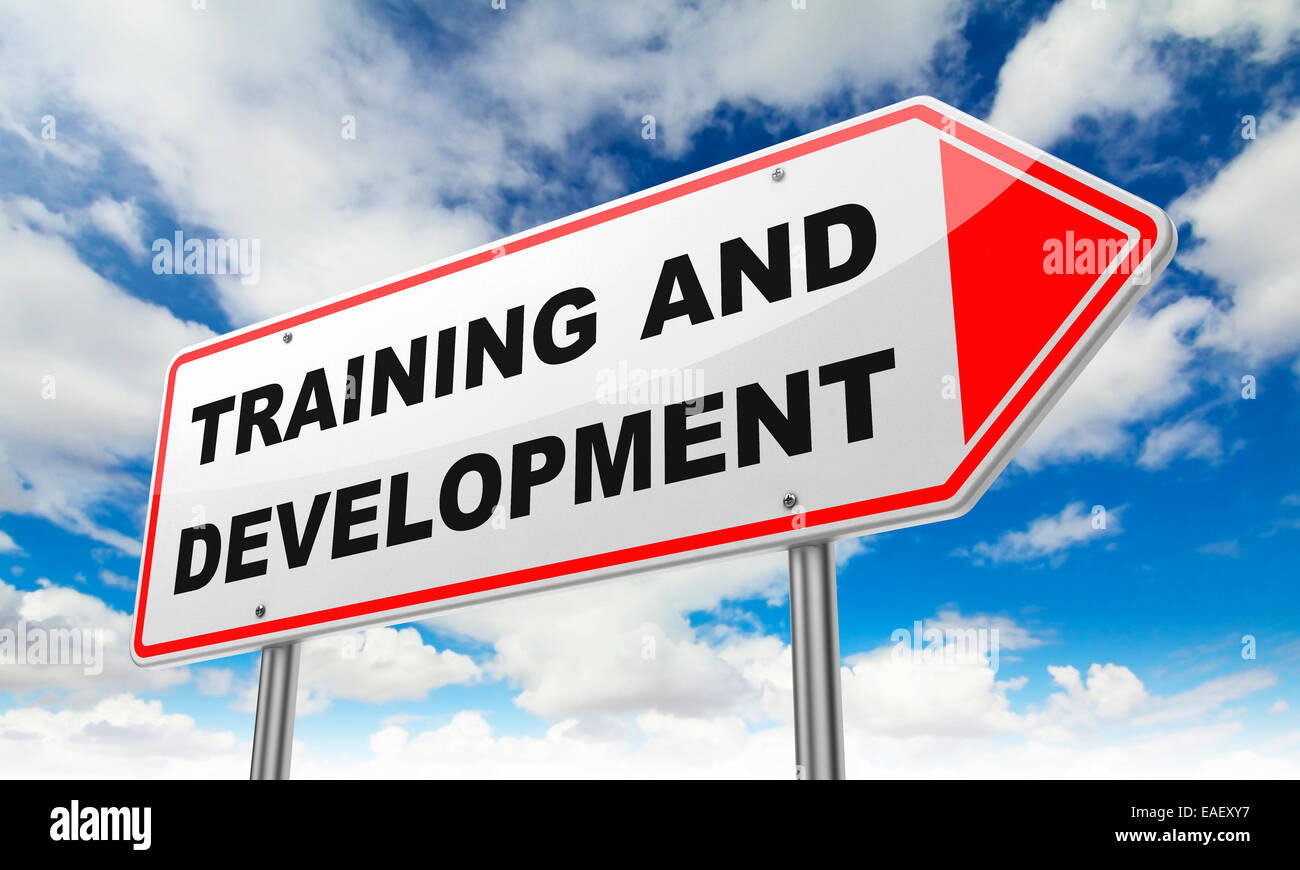 Training and Development on Red Road Sign Stock Photo - Alamy