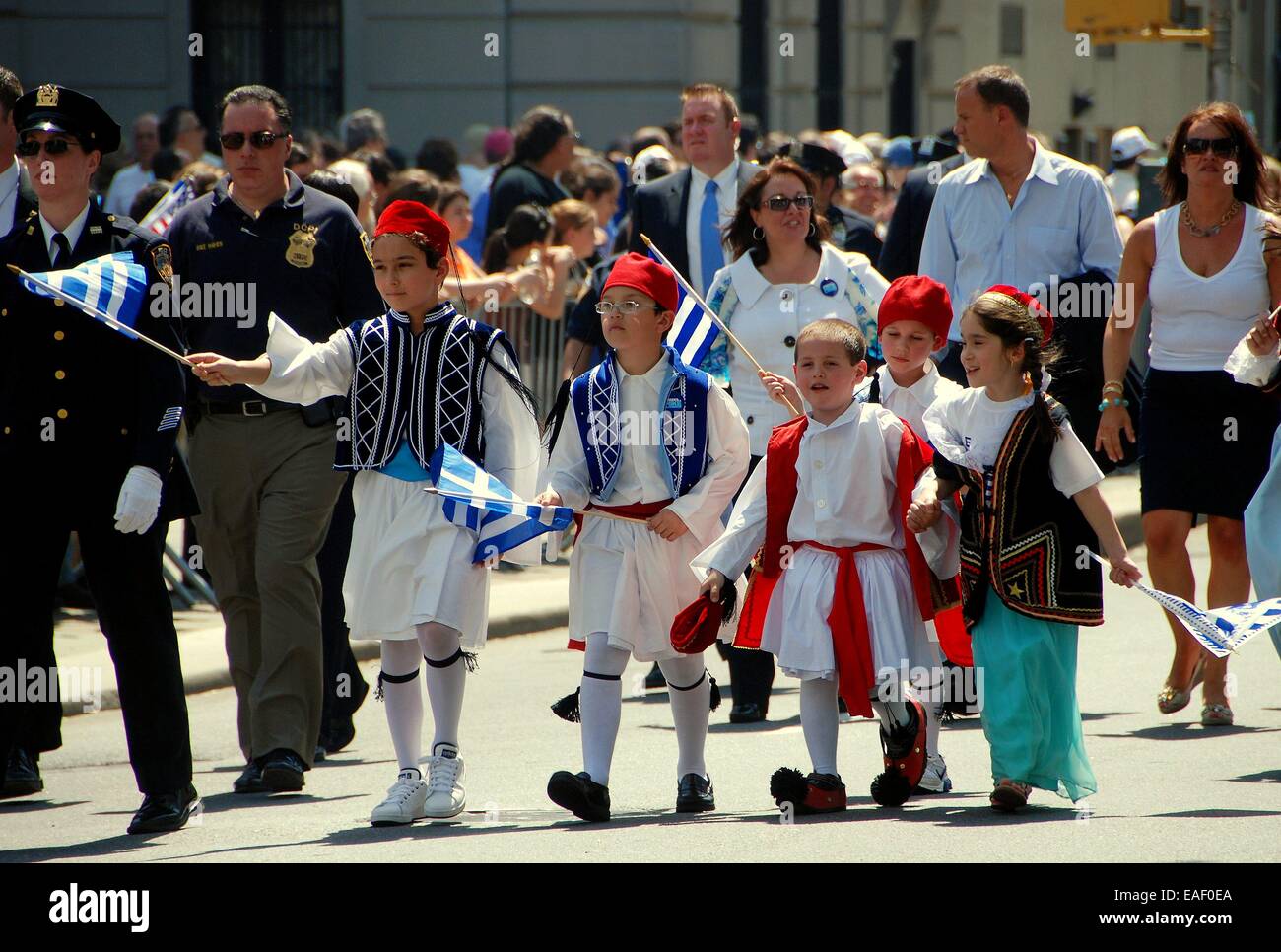 NYC:  A group of children wearing traditional clothing marching in the Greek Independence Day Parade on Fifth Avenue Stock Photo