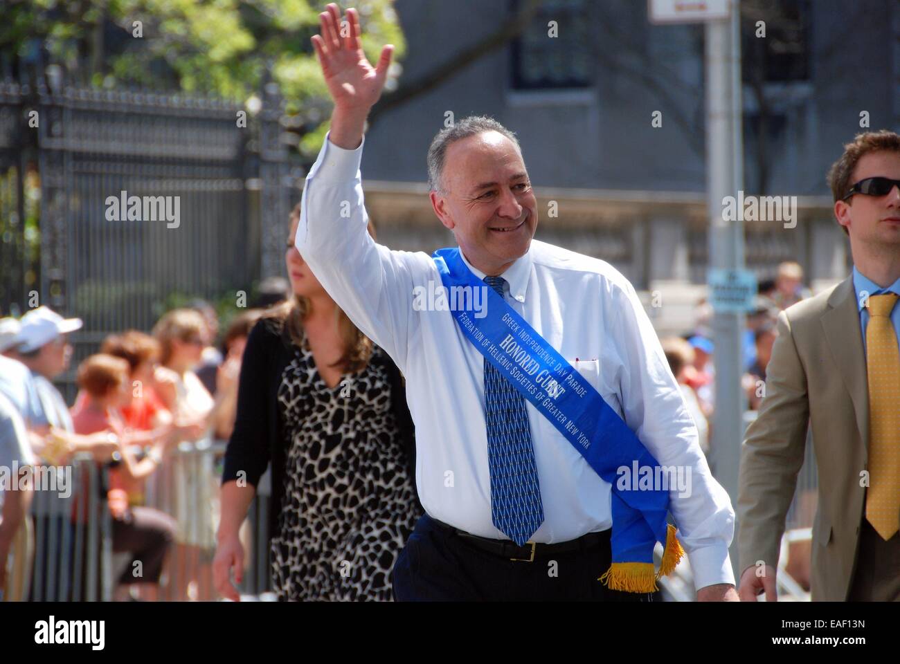 NYC:  New York Senator Charles Schumer waves to the crowds while marching in the annual Greek Independence Day Parade Stock Photo