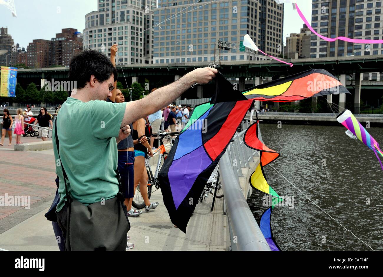 NYC Families flying kites on Hudson River Pier 70 during the FlyNY
