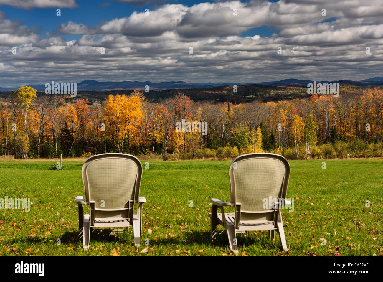 Two lawn chairs at Green Bay Loop overlooking Peacham and hills
