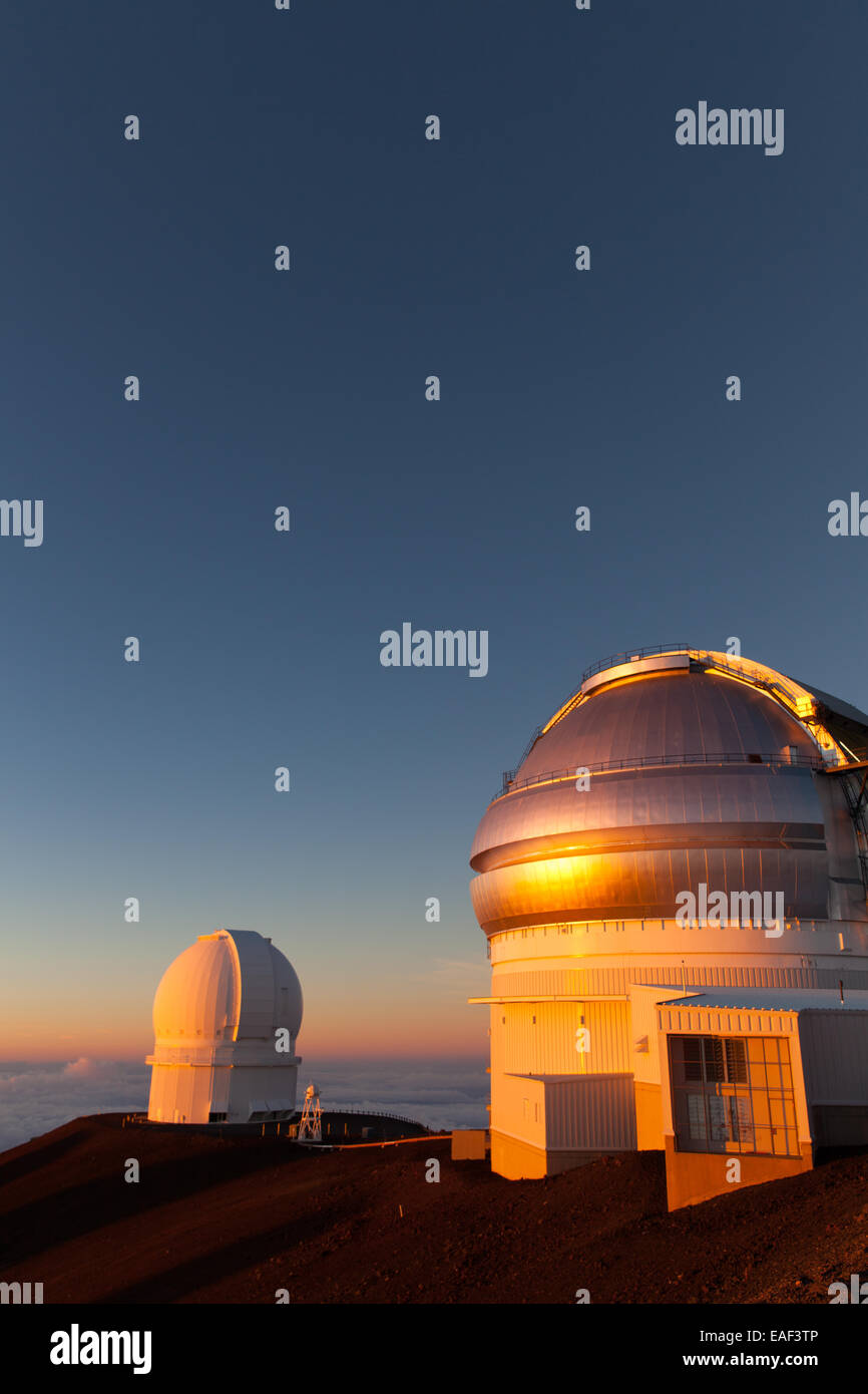 Gemini Observatory and The CanadaFranceHawaii Telescope at sunset on