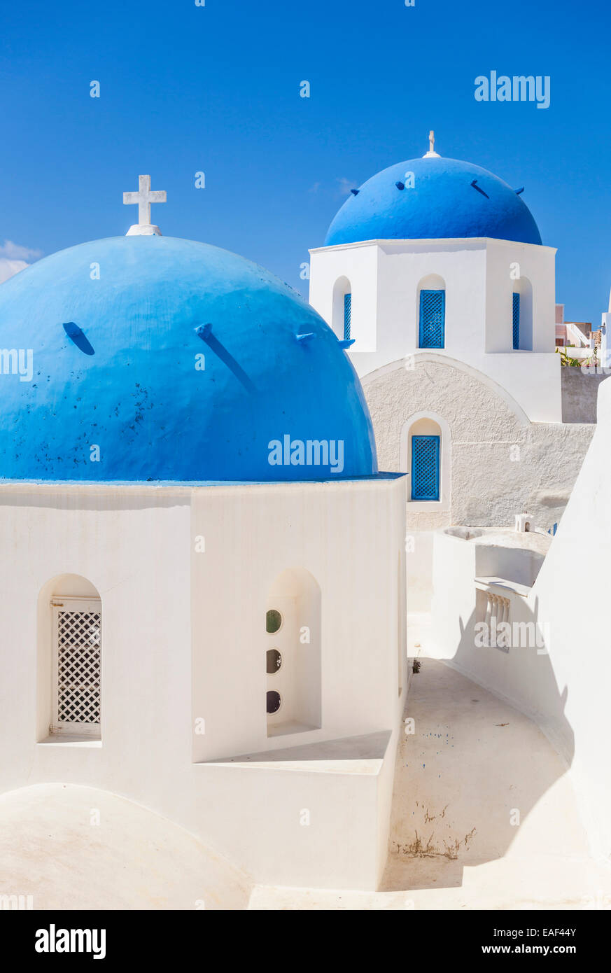 White churches and blue domes in the village of Oia, Santorini, Thira, Cyclades Islands, Greek Islands, Greece, EU, Europe Stock Photo