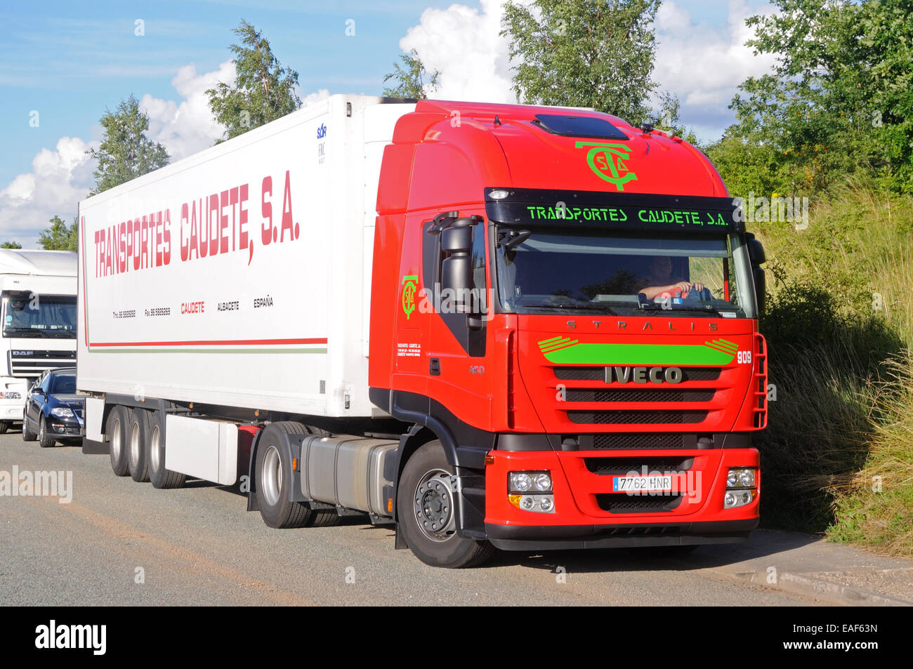 An Iveco Stralis 460 tractor unit & trailer in the livery of Spanish carrier Transportes Caudete. Groby, Leicestershire, England Stock Photo