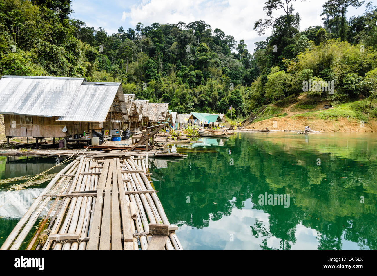 Floating home of the forest staff, Motor raft wharf in Ratchaprapha Dam at Khao Sok National Park, Surat Thani, Thailand Stock Photo