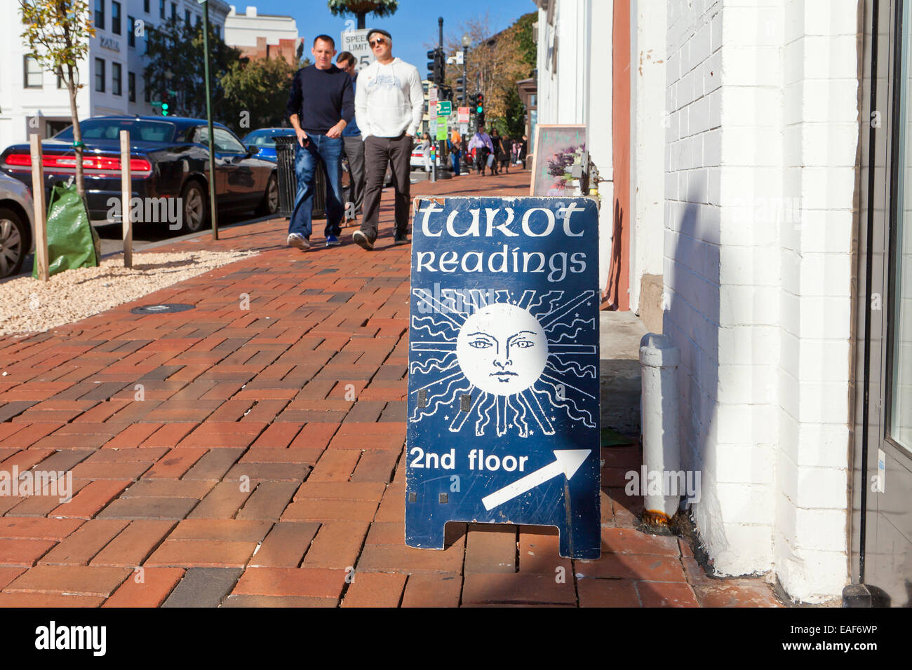 Tarot reading sign on sidewalk - Georgetown, Washington, DC USA Stock Photo