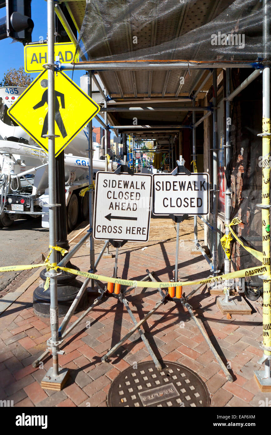 Sidewalk Closed sign USE OPPOSITE SIDE SIGN left ARROW