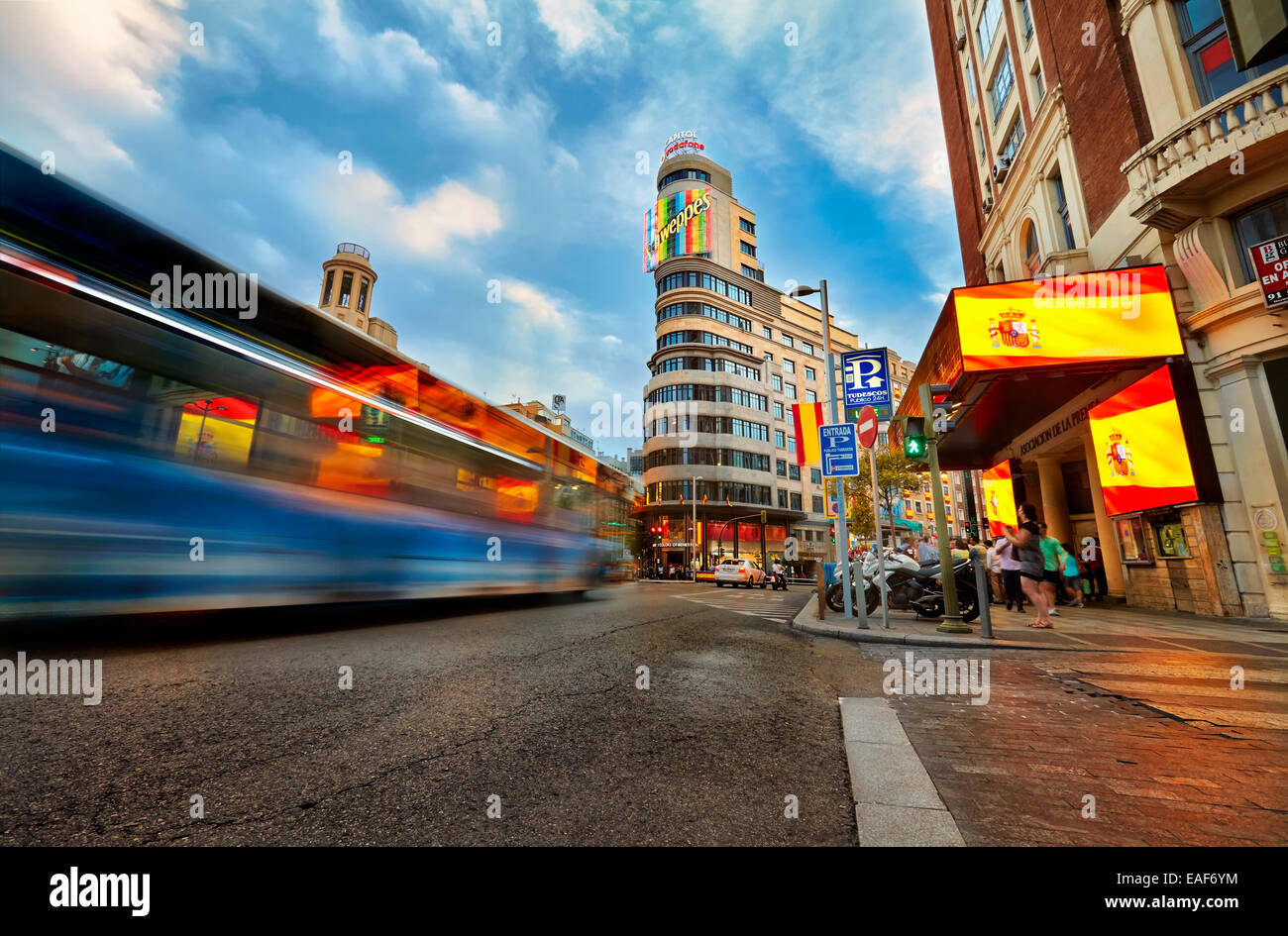 Traffic and luminous signs at Gran Via street at the intersection with Callao square. Madrid. Spain Stock Photo