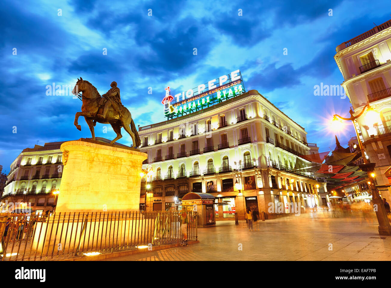 Carlos III statue and TIo Pepe luminous sign at  Puerta de Sol square. Madrid, Spain Stock Photo
