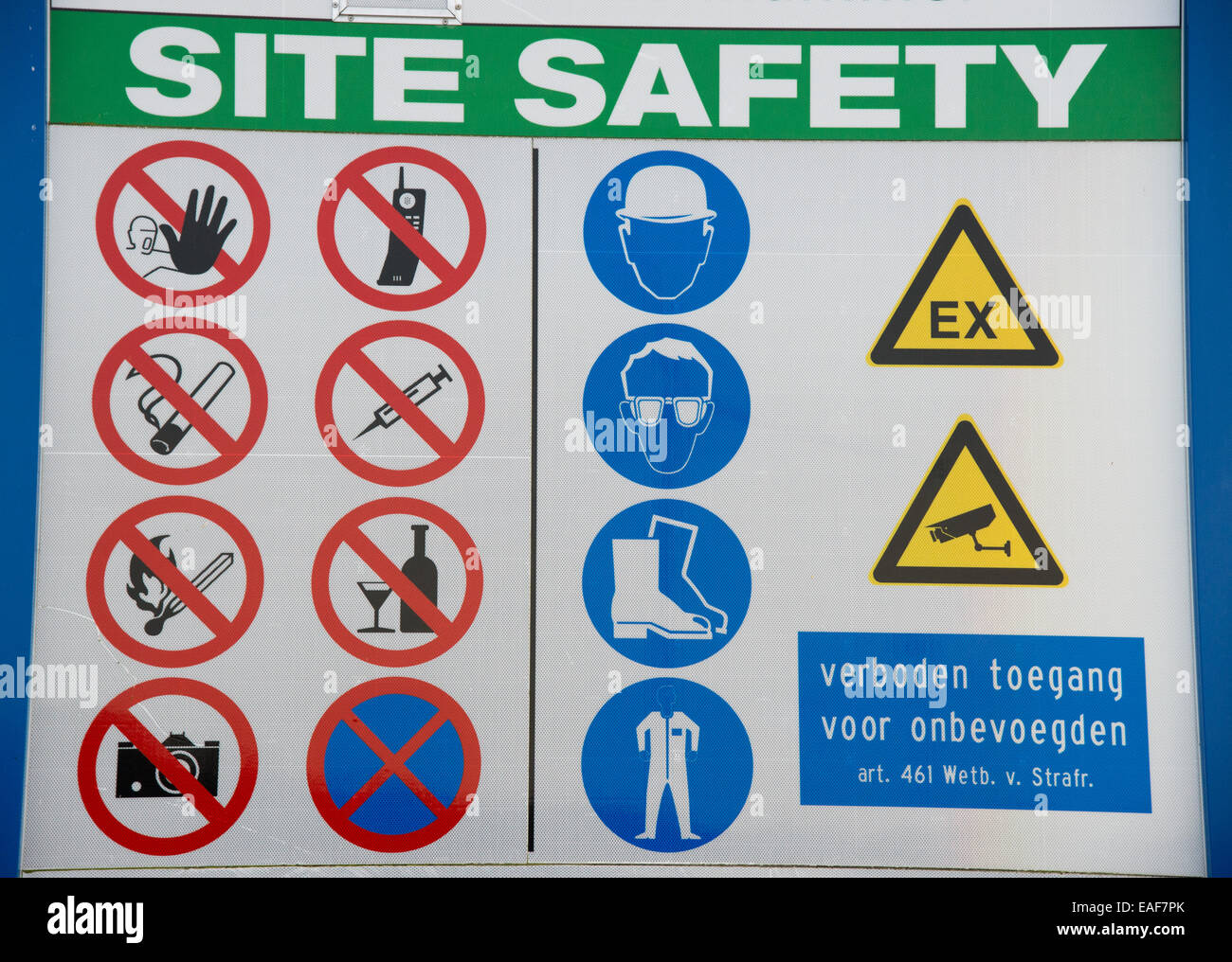 many warning signs at industry site at maasvlakte Stock Photo Alamy