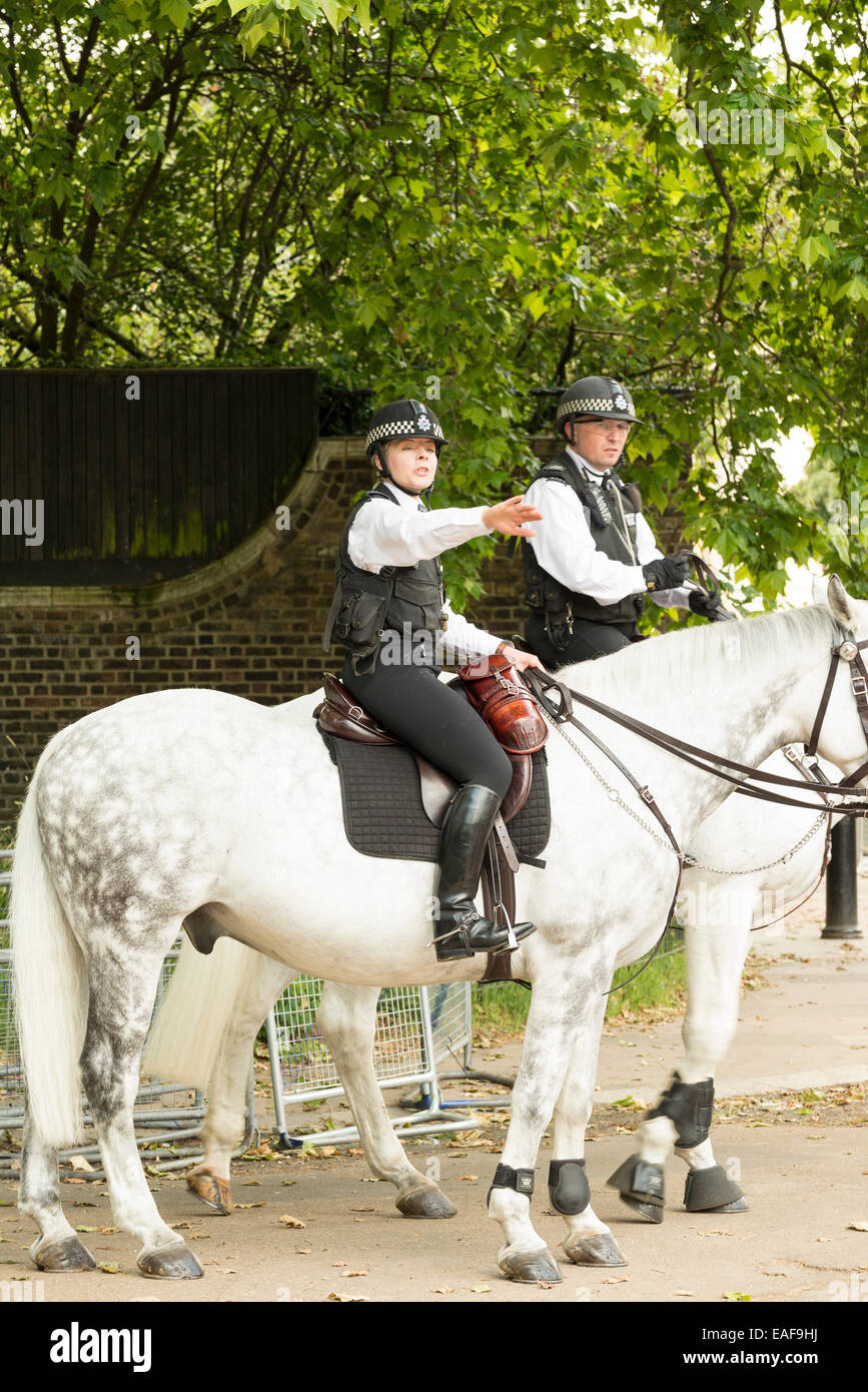 LONDON, UNITED KINGDOM - JUNE 5, 2014:  Police on the horse at The Mall, near Buckingham Palace Stock Photo