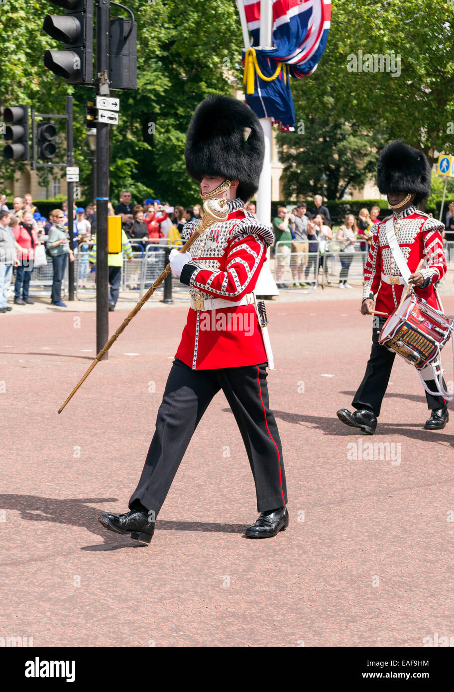 LONDON, UNITED KINGDOM - JUNE 5, 2014: British guardsmen march down the Mall in London - outside Buckingham Palace. Stock Photo