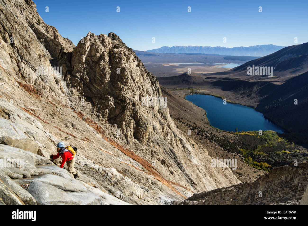 man climbing up Laurel Mountain above Convict Lake Stock Photo