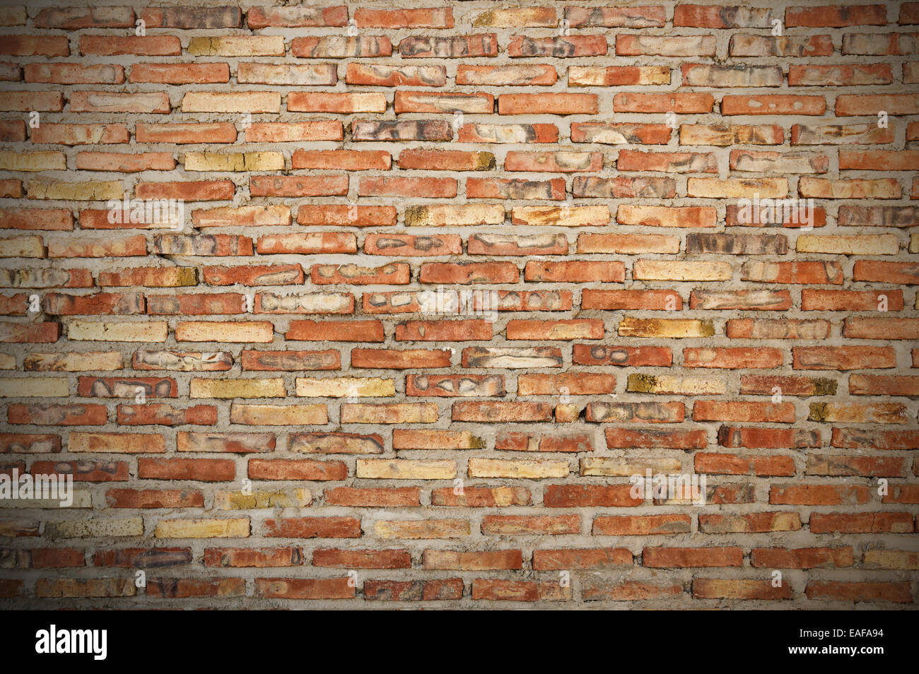 rough brick wall background texture with vignette Stock Photo