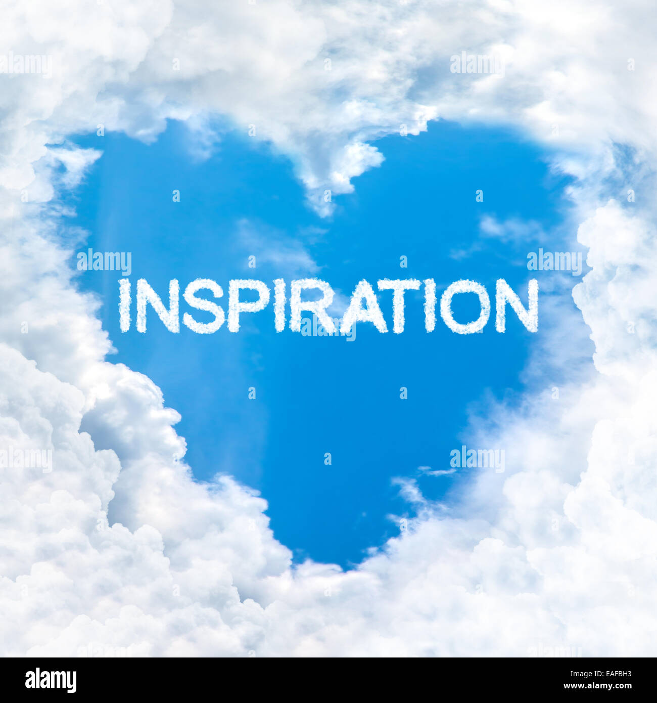inspiration word inside heart cloud  blue sky background only Stock Photo