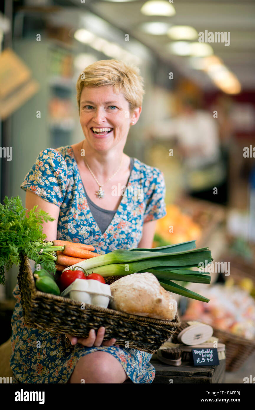 The Better Food Company organic supermaket in St. Werburgh's, Bristol UK - Lucy Gatward, Marketing Manager 2014 Stock Photo