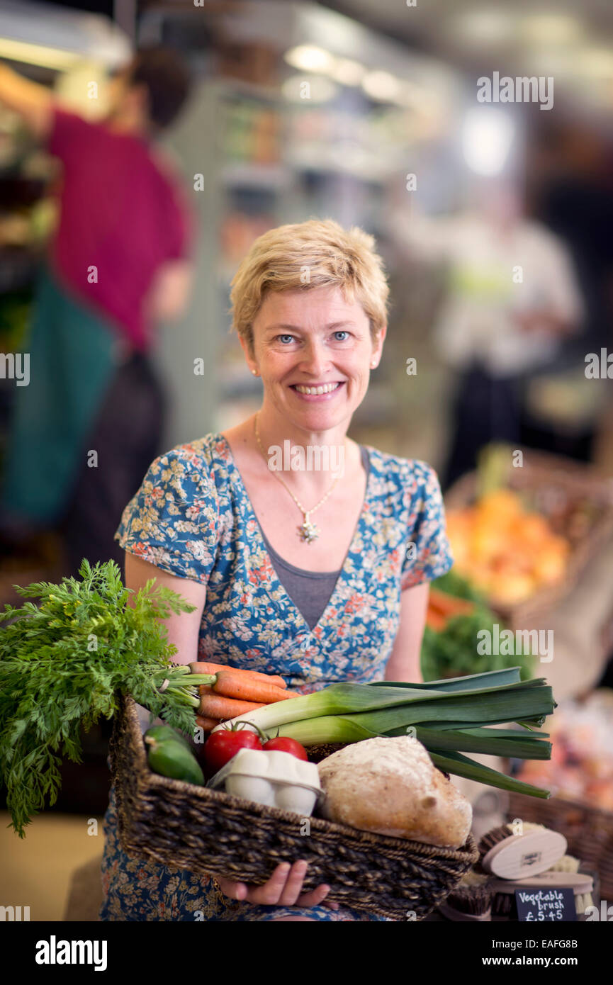 The Better Food Company organic supermaket in St. Werburgh's, Bristol UK - Lucy Gatward, Marketing Manager 2014 Stock Photo