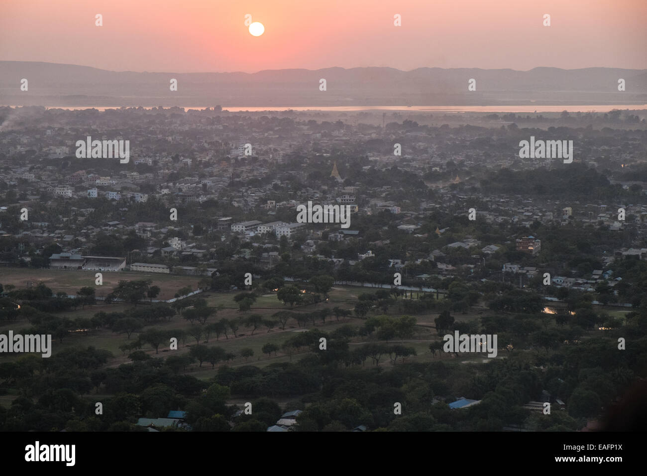Sunset from Mandalay Hill, Mandalay, Myanmar,Burma,South East Asia, Asia, with Irradawwy River and town below hill,Myanmar,Burma Stock Photo