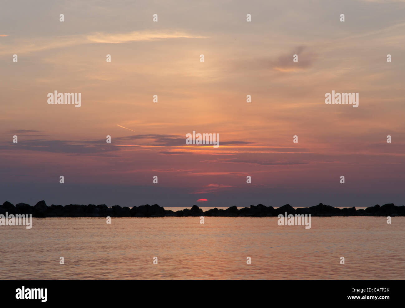 Sunrise on the sea Stock Photo - Alamy
