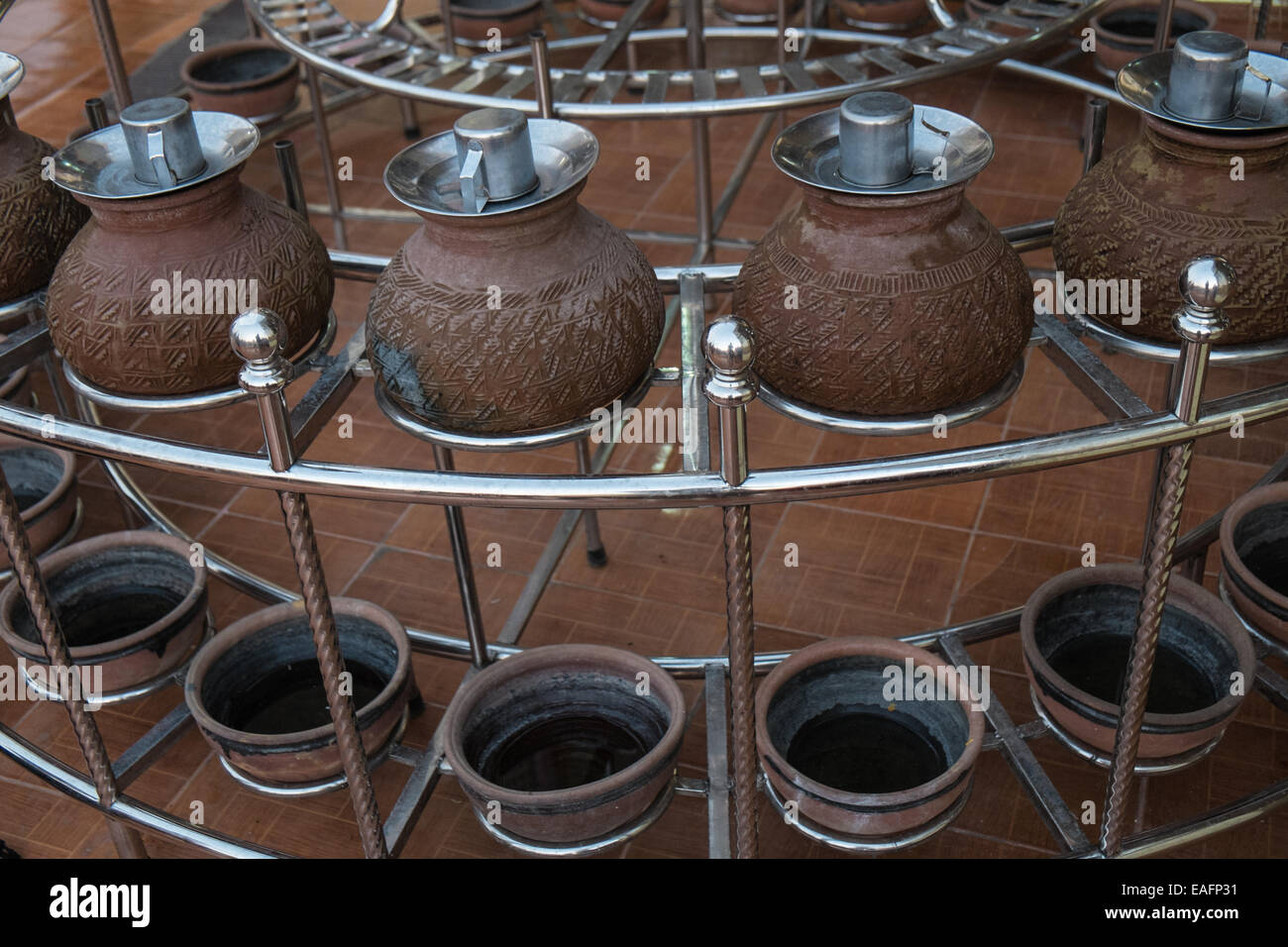 Clay pottery pots containing water at top of Mandalay Hill. Mandalay Hill, Mandalay, Myanmar,Burma,South East Asia, Asia, Stock Photo