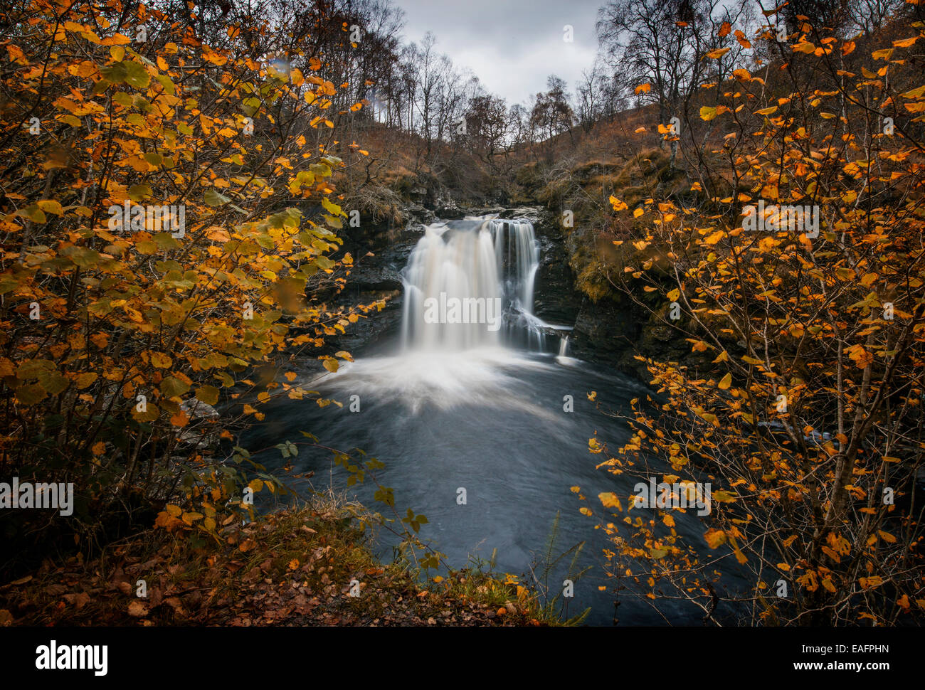 The Falls of Falloch,  (Gaelic: Eas Falach, means Hidden waterfall) is a waterfall and local beauty spot on the river Falloch. Crianlarich, Scotland, Stock Photo