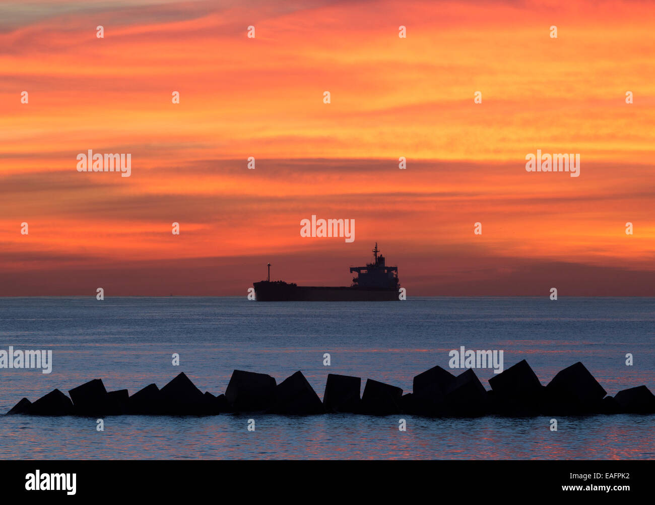 Oil tanker at sunrise Stock Photo