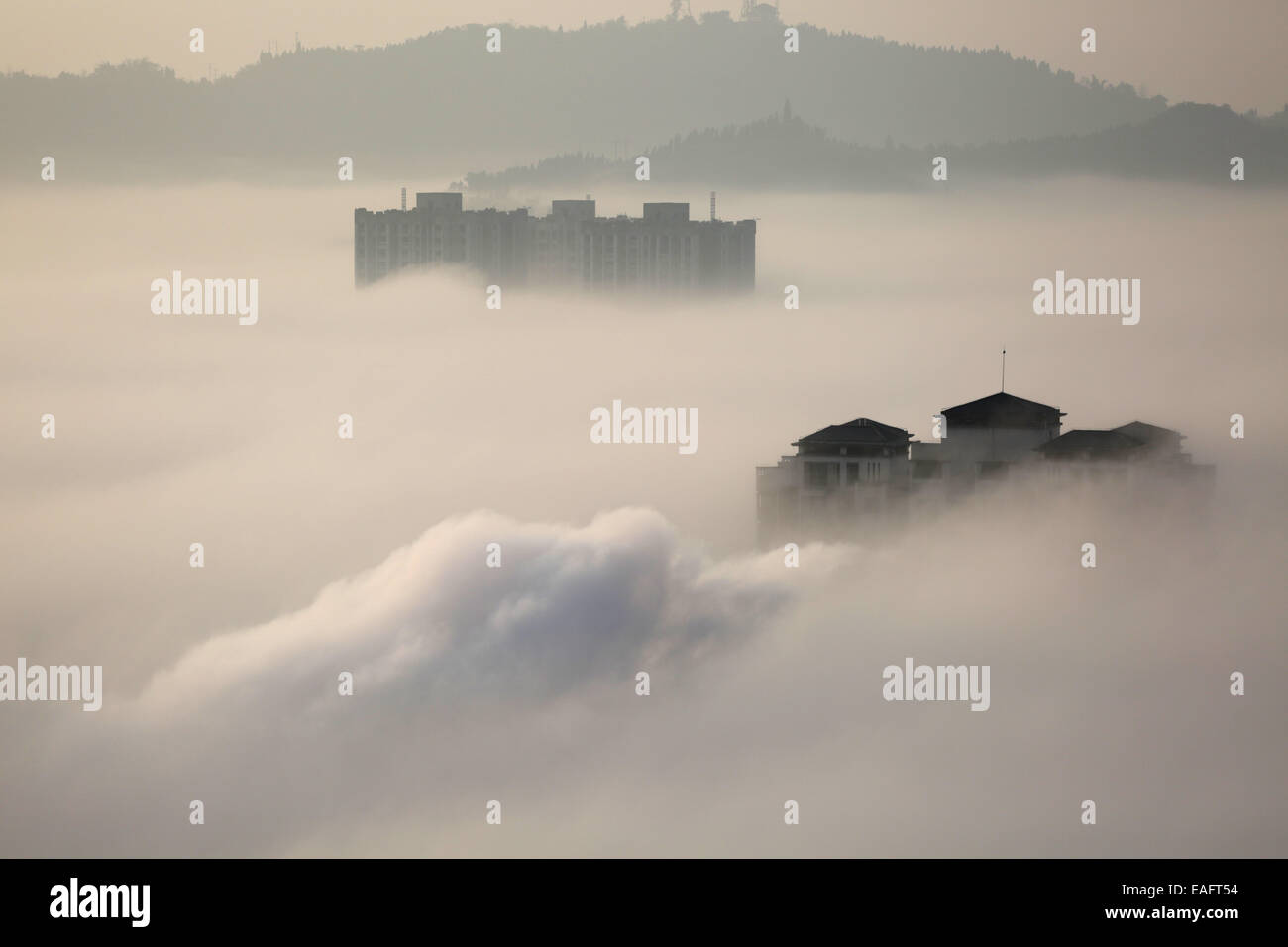 Chongqing. 14th Nov, 2014. A stratus cloud casts over Dazu District of southwest China's Chongqing, early on Nov. 14, 2014. Credit:  Luo Guojia/Xinhua/Alamy Live News Stock Photo