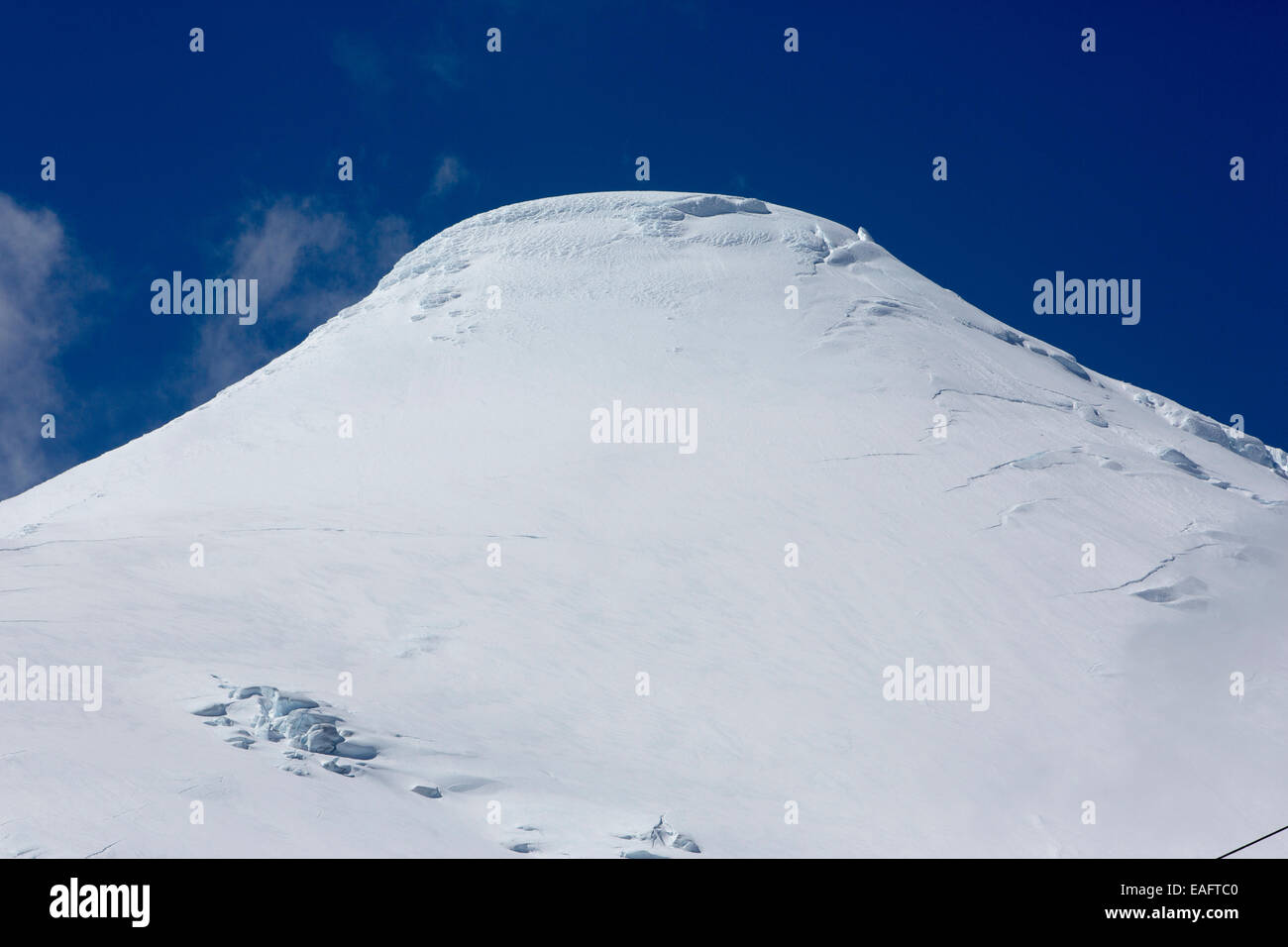 The top of a snow capped volcano, Volcan Osorno, Chile. Stock Photo