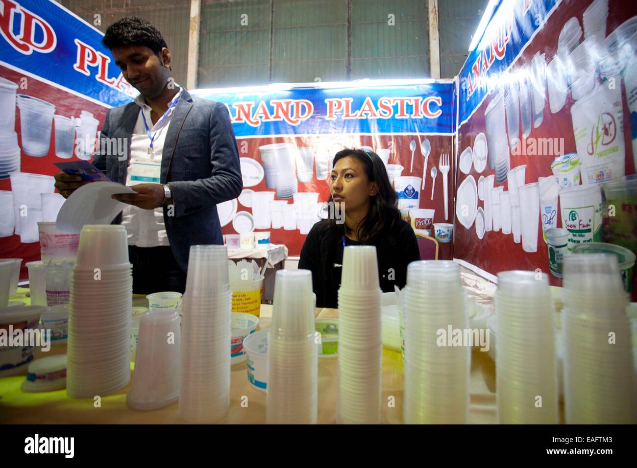 Kathmandu, Nepal. 14th Nov, 2014. Exhibitors display plastic products