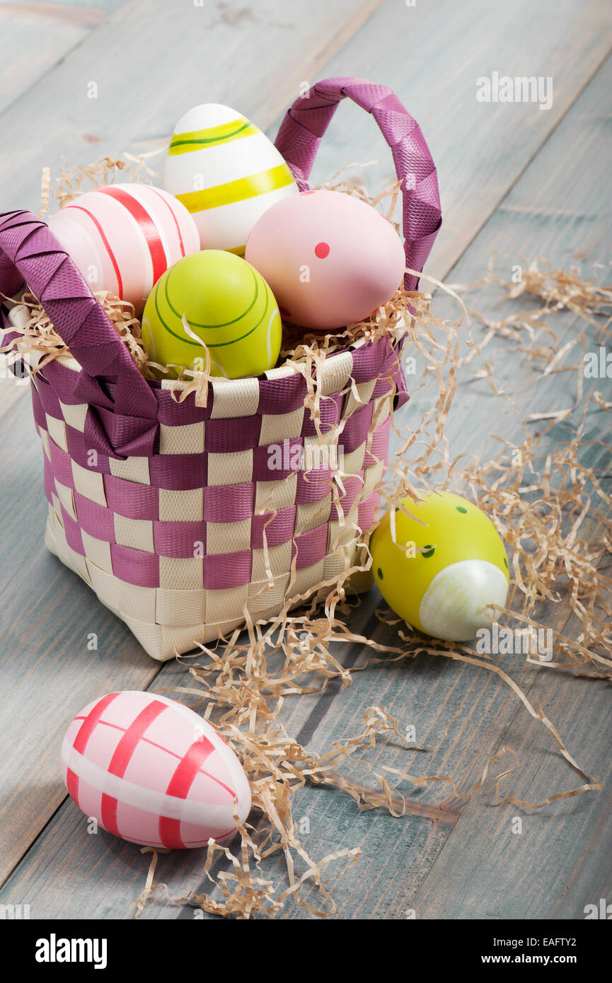 colorful easter eggs in basket Stock Photo Alamy