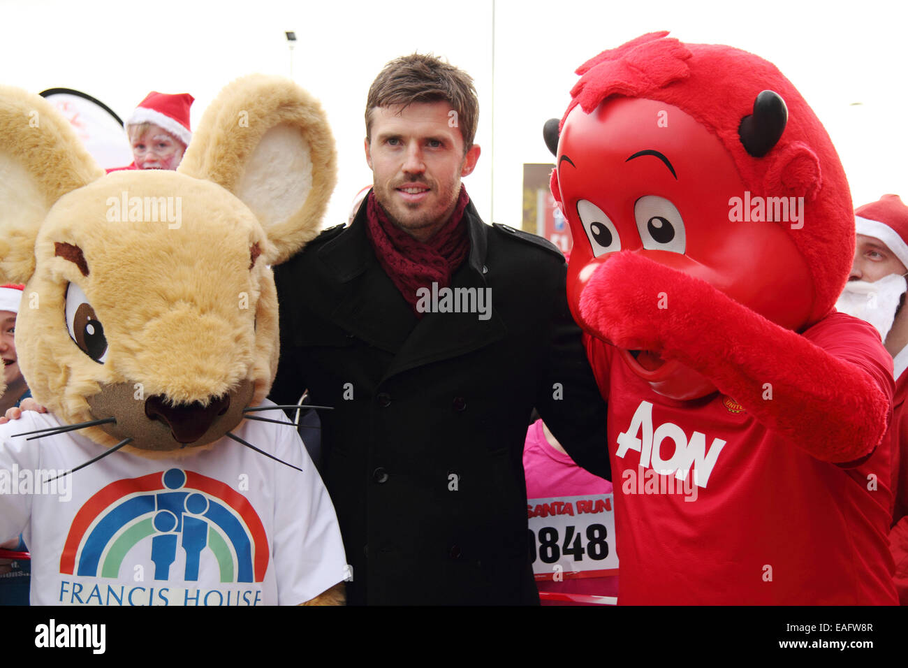 Manchester United football player Michael Carrick kicks off the 7th annual Manchester  United Foundation Santa Run Featuring: Michael Carrick Where: Manchester,  United Kingdom When: 15 Dec 2013 Stock Photo - Alamy