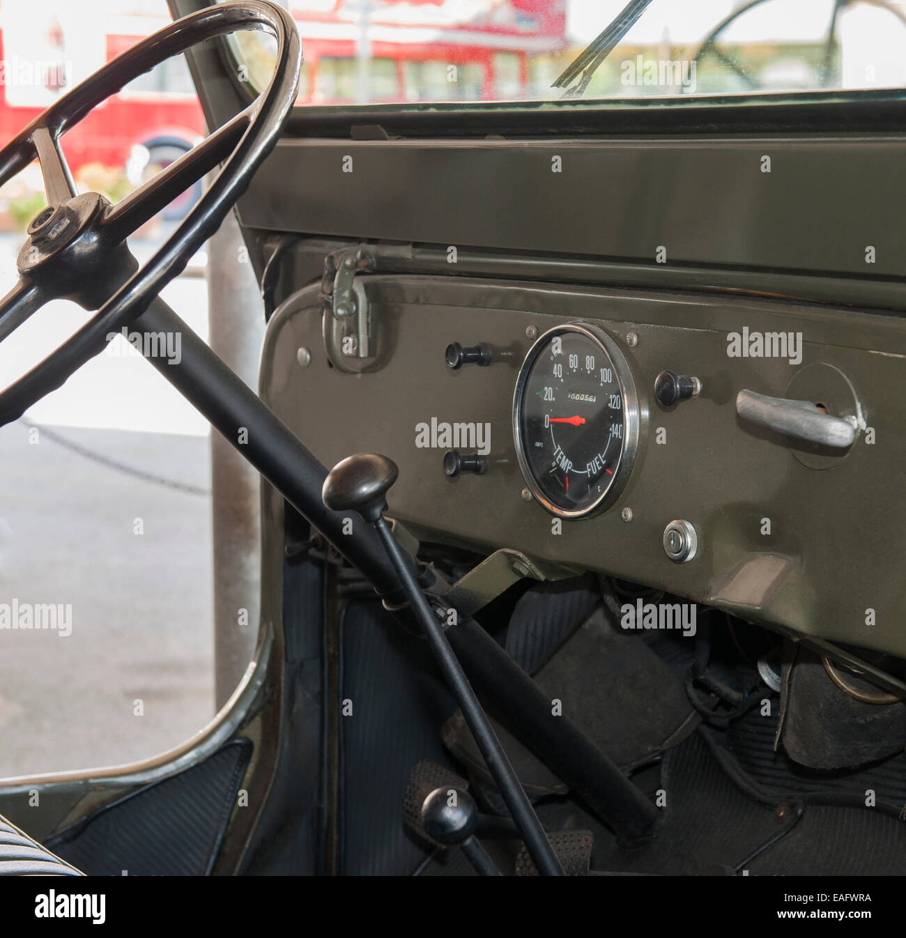 Interior dashboard of an old army jeep with steering wheel Stock Photo