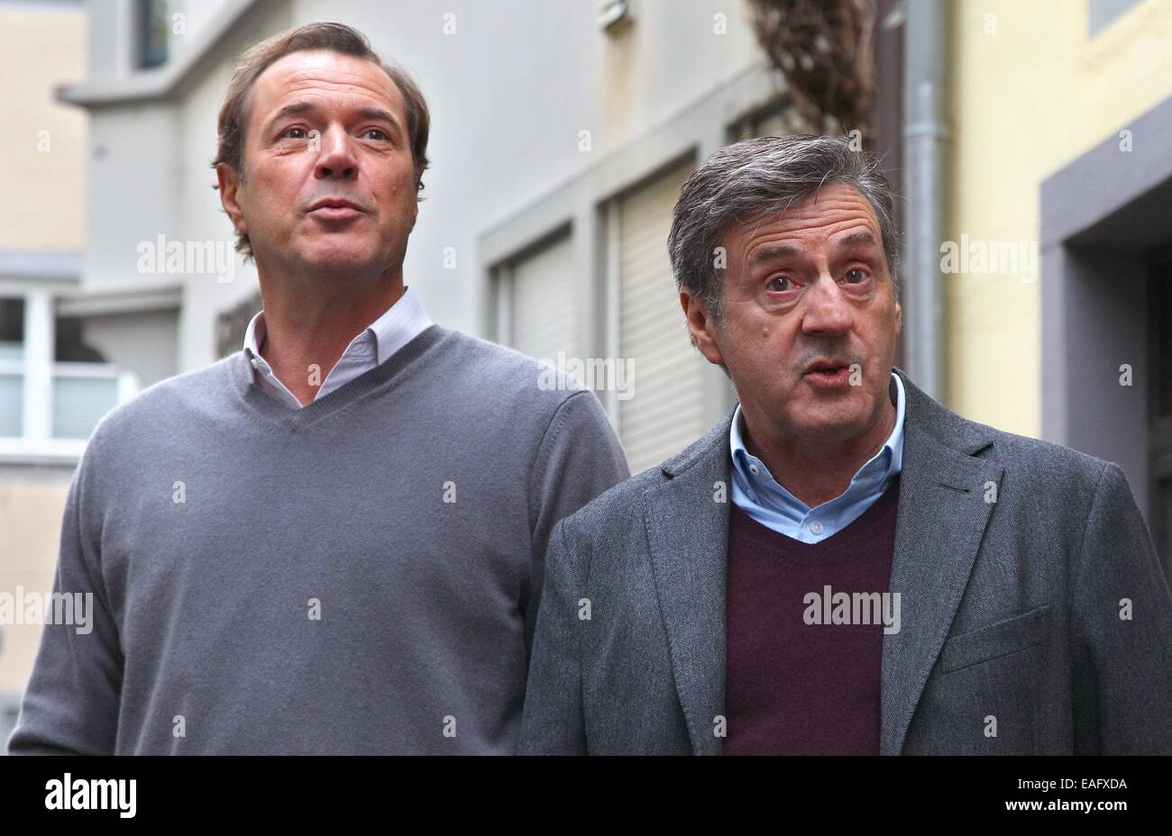 French actor Daniel Auteuil (R) and German actor Sebastian Koch pose on the set of the film 'Bamberski-Der Fall Kalinka' (lit. the Kalinka case) in Lindau, Germany, 14 November 2014. The French and German justice system have been dealing with the Kalinka case since three decades. The film focusses on the death of the 14-year old girl and her father's actions of vigilantism. Photo: Karl-Josef Hildenbrand/dpa Stock Photo