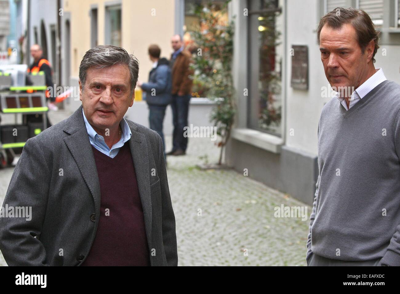 French actor Daniel Auteuil (L) and German actor Sebastian Koch pose on the set of the film 'Bamberski-Der Fall Kalinka' (lit. the Kalinka case) in Lindau, Germany, 14 November 2014. The French and German justice system have been dealing with the Kalinka case since three decades. The film focusses on the death of the 14-year old girl and her father's actions of vigilantism. Photo: Karl-Josef Hildenbrand/dpa Stock Photo