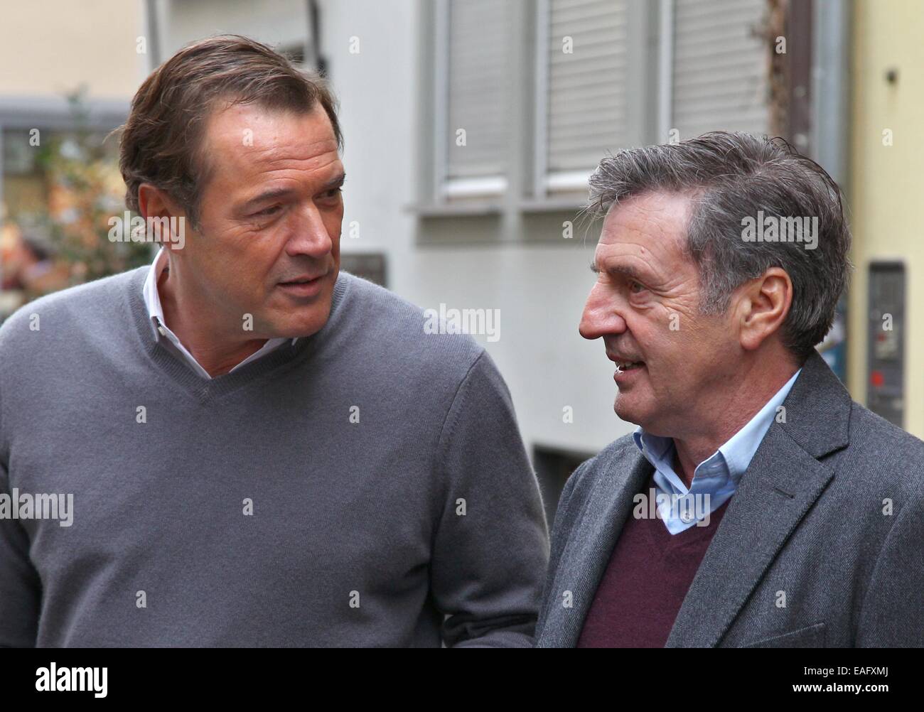 French actor Daniel Auteuil (R) and German actor Sebastian Koch pose on the set of the film 'Bamberski-Der Fall Kalinka' (lit. the Kalinka case) in Lindau, Germany, 14 November 2014. The French and German justice system have been dealing with the Kalinka case since three decades. The film focusses on the death of the 14-year old girl and her father's actions of vigilantism. Photo: Karl-Josef Hildenbrand/dpa Stock Photo