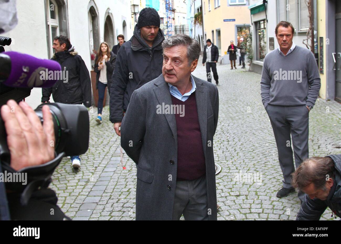 French actor Daniel Auteuil (L) and German actor Sebastian Koch pose on the set of the film 'Bamberski-Der Fall Kalinka' (lit. the Kalinka case) in Lindau, Germany, 14 November 2014. The French and German justice system have been dealing with the Kalinka case since three decades. The film focusses on the death of the 14-year old girl and her father's actions of vigilantism. Photo: Karl-Josef Hildenbrand/dpa Stock Photo