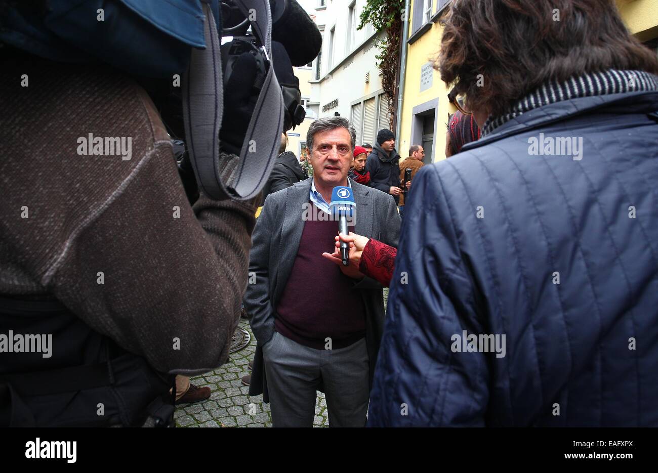 Actor Daniel Auteuil speaks to the press on the set of the film 'Bamberski-Der Fall Kalinka' (lit. the Kalinka case) in Lindau, Germany, 14 November 2014. The French and German justice system have been dealing with the Kalinka case since three decades. The film focusses on the death of the 14-year old girl and her father's acts of vigilantism. Photo: Karl-Josef Hildenbrand/dpa Stock Photo