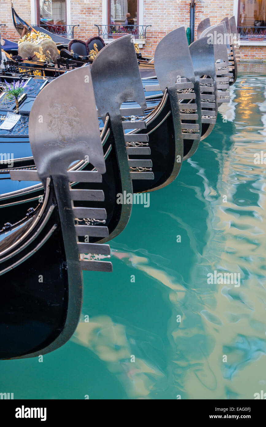 Bows of gondolas in a row, Venice, Veneto, Italy Stock Photo