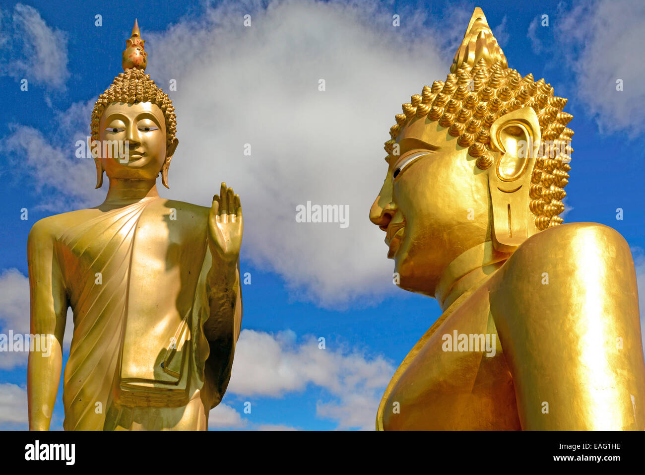 Two golden Buddhas in Thailand Stock Photo