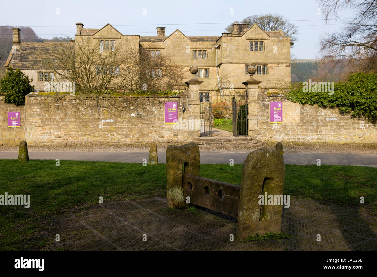 Eyam  Hall an historic gritstone Jacobean manor house situated in the Peak District village of Eyam Derbyshire Stock Photo